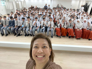 Class photo with students from St. George's School, with their teachers and school principal and deputy principal.