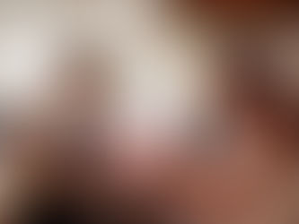 A salesperson presenting a product to a customer at a crafts fair.