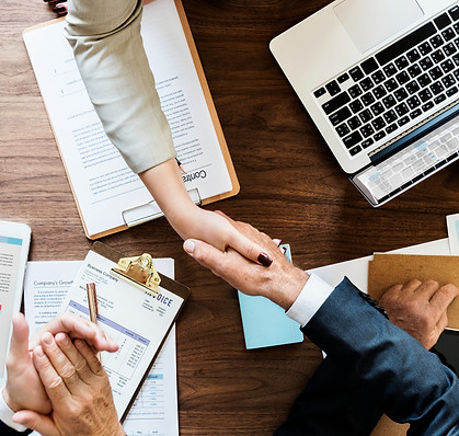 business-people-shaking-hands-together.jpg