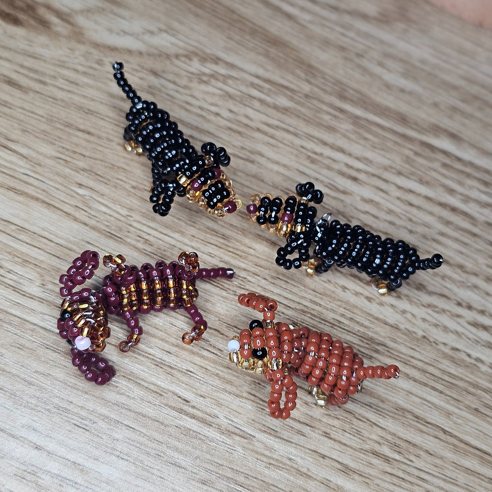 Thumbnail: Handmade beaded sausage dogs