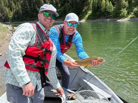 Fishing Guide Ben with a Happy Client