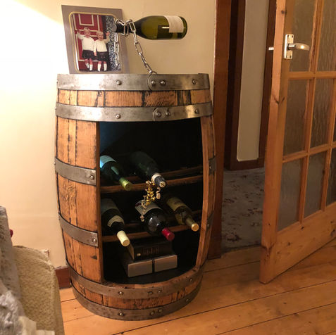 Wine cave, wine storage, happy customer, bespoke furniture, whisky barrel furniture, whiskey barrel furniture