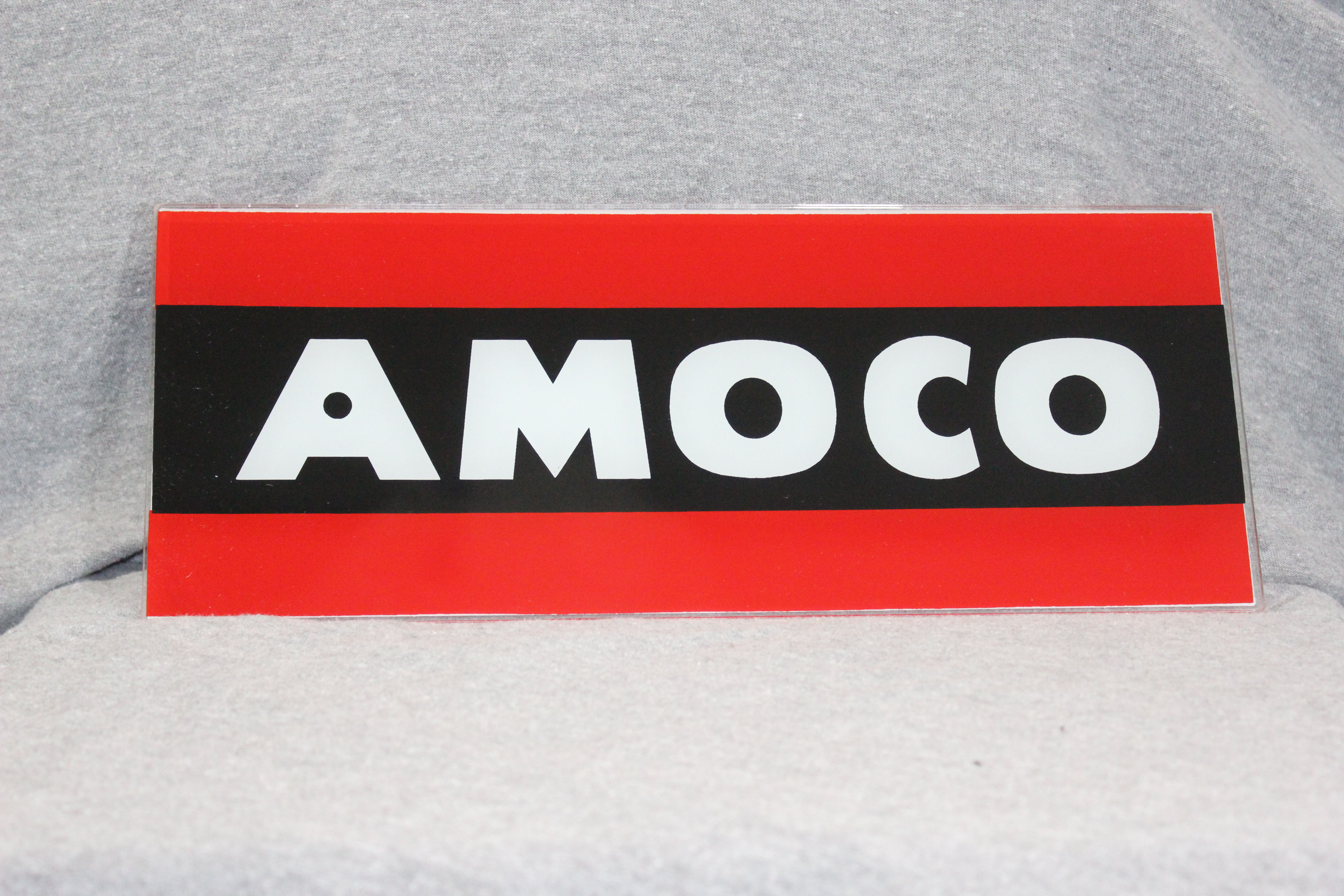 Amoco Ad Glass