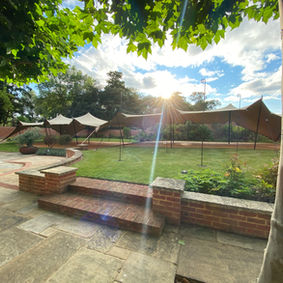 30m x 10.5m stretch tent over 2 tier garden