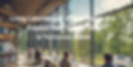 People work at desks in a modern office with large windows overlooking trees. Text: "Living Laboratories: Where Nature and Science Meet."