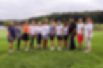 Twelve women posing for a golf clinic photo at Farmstead Golf & Country Club