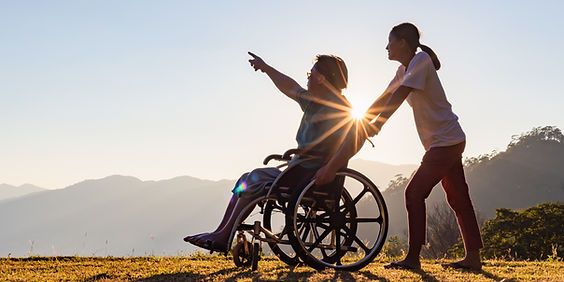2 wheelchair and sunset_edited.jpg