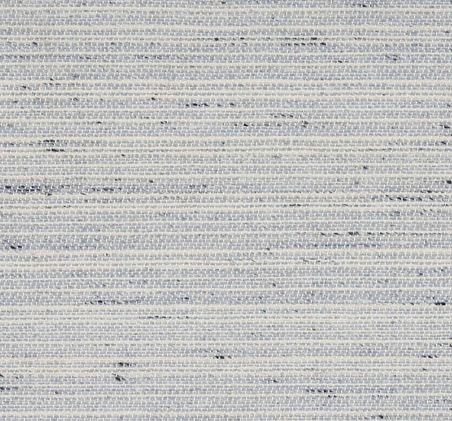 A close detailing the texture in the carpet Fauna Striae in color Seabreeze.