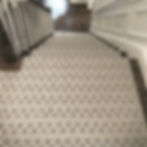 geometric stair runner installed on stairs.