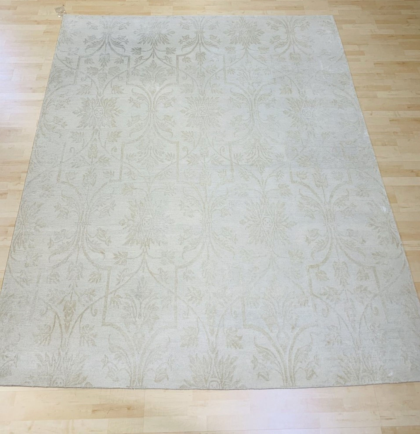 ivory damask design hand-knotted rug