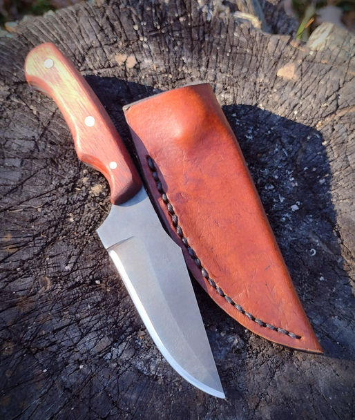 Grandpa treats grandson to a day at the forge.