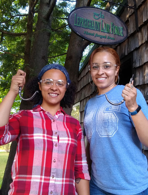 Ashley and Bryana top off an event filled West Michigan weekend with a "Learn to Forge" experience.