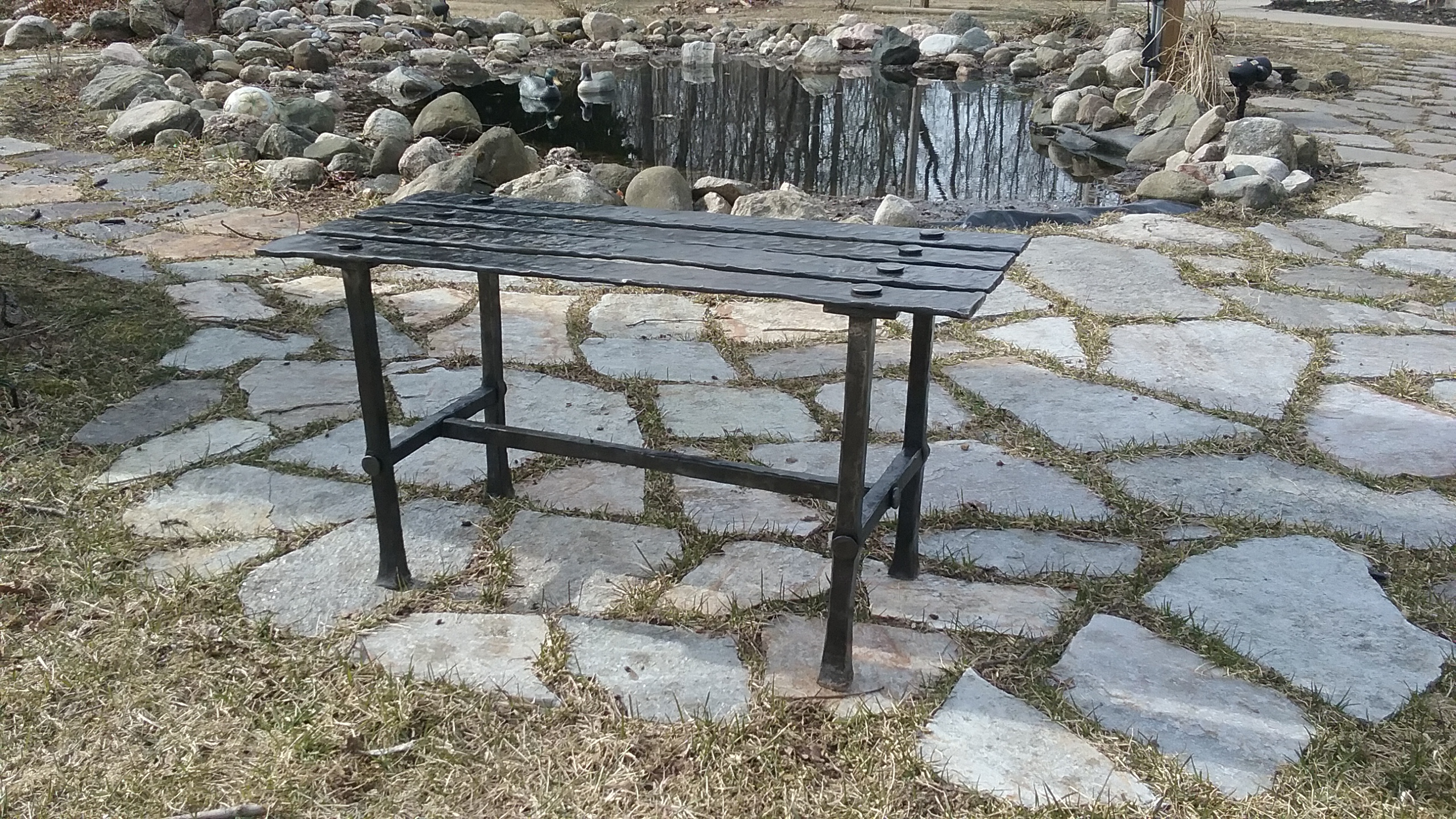 Hand forged iron bench