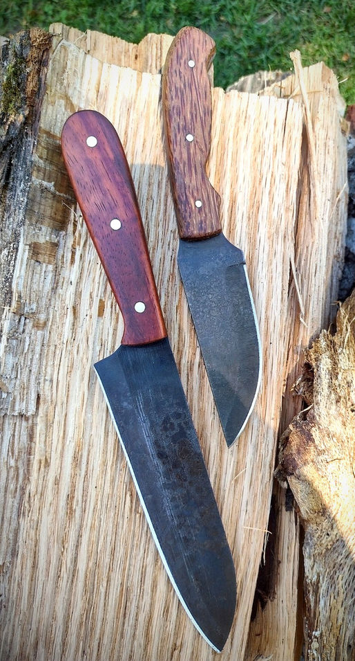 Kris and his dad Duane celebrate a Fathers Day gift at the forge.