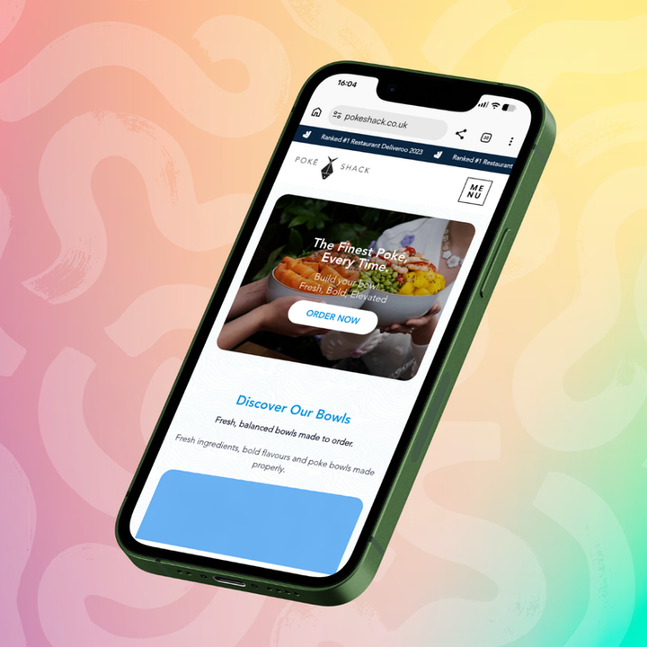 Poke Shack website displayed on a mobile phone, designed by The Wix Guys