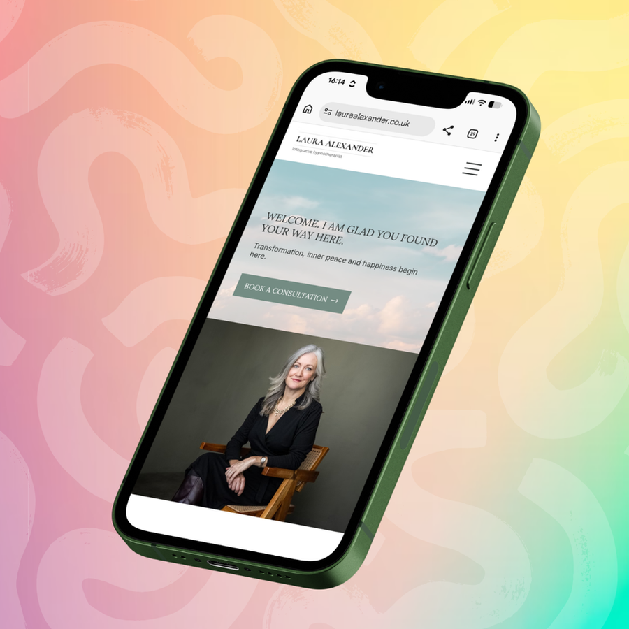 Laura Alexander Hypnotherapy website displayed on a mobile phone, designed by The Wix Guys