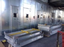 HVAC technician servicing commercial equipment