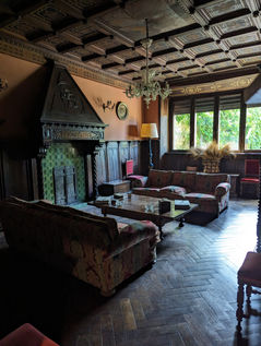 Sitting room with couches and fireplace