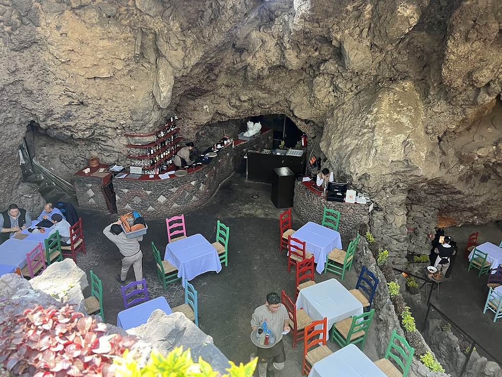 A view of the bar area from the top of the staircase