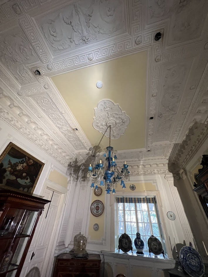 Notice the ceiling & its decorative details. Also note the ceiling & wall decorative trim in the dining room.
