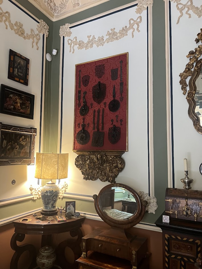 A shot of other interesting pieces of furniture & things on the wall in Casa Guillermo Tovar de Teresa