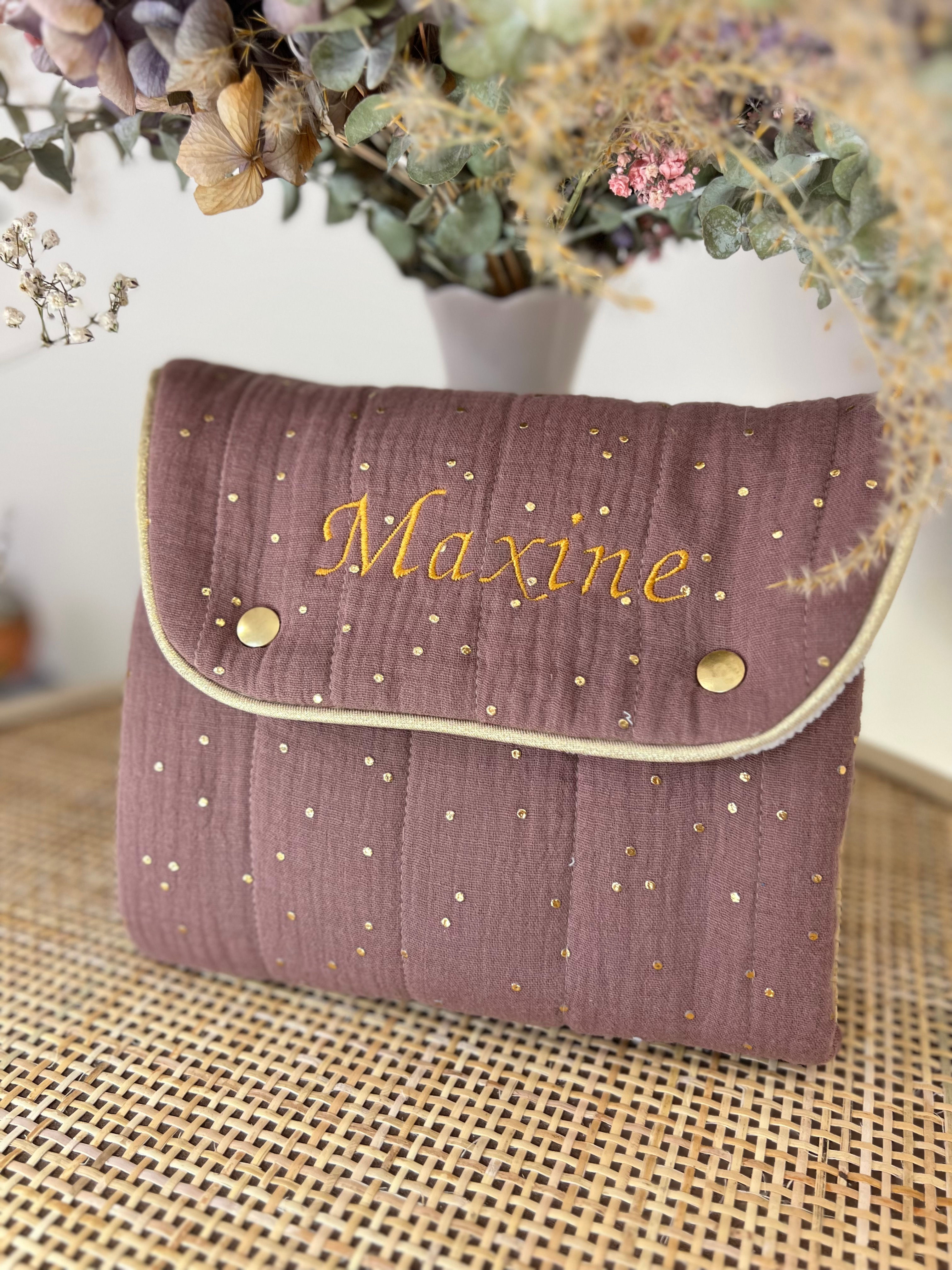 Tapis a langer nomade