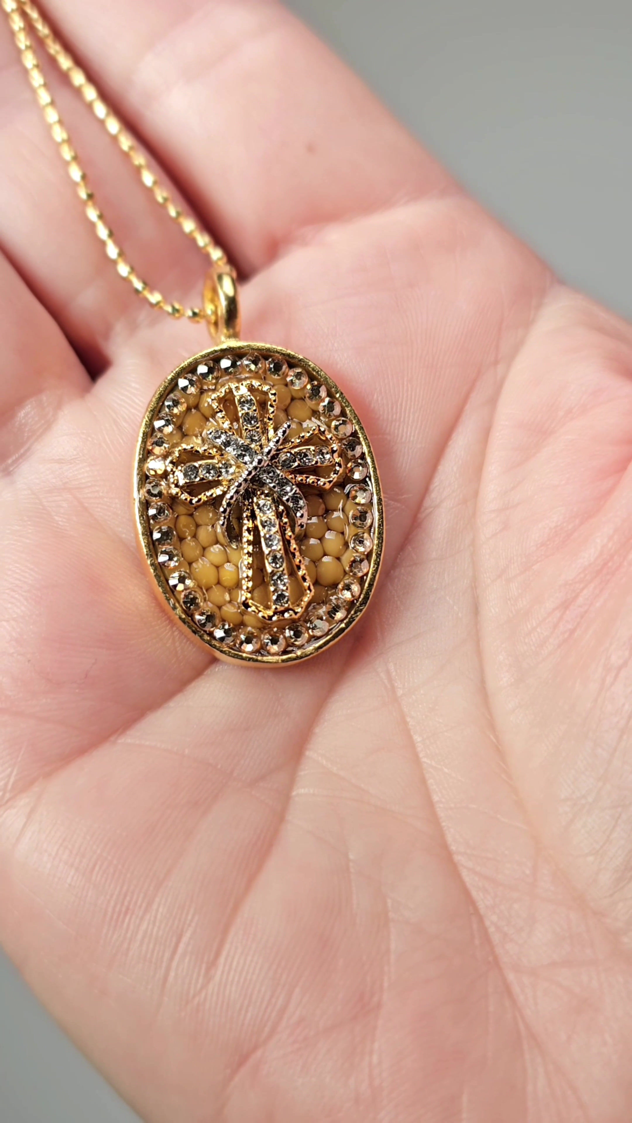 "Rise" Gold Cross Oval Necklace