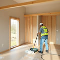 worker cleaning a constructed interior h