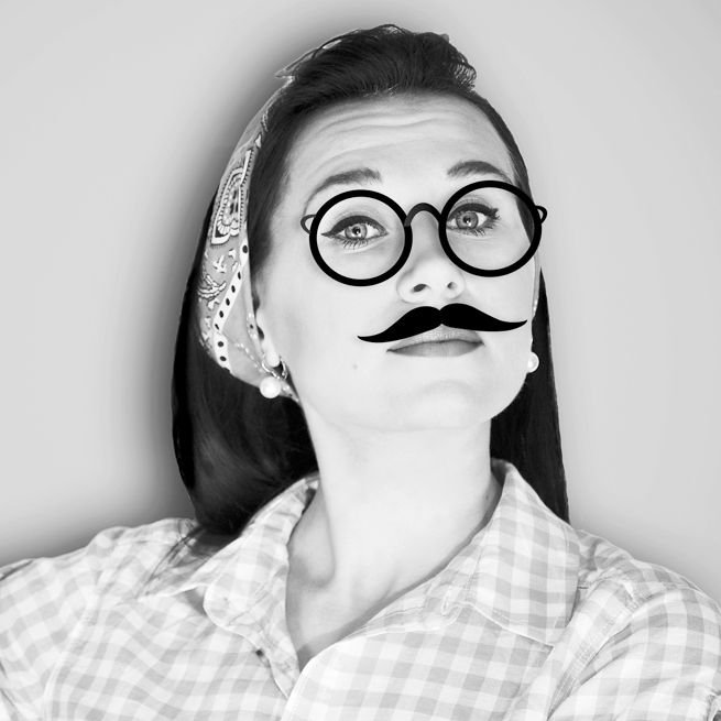 Woman wearing fake mustache_edited.jpg