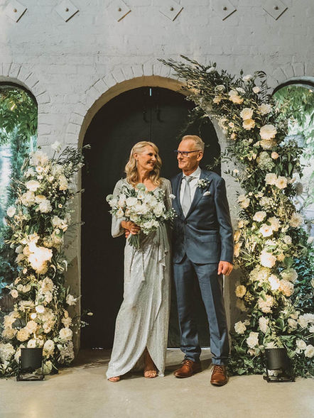 Statement Wedding ceremony florals for Melbourne couple in classic white and green