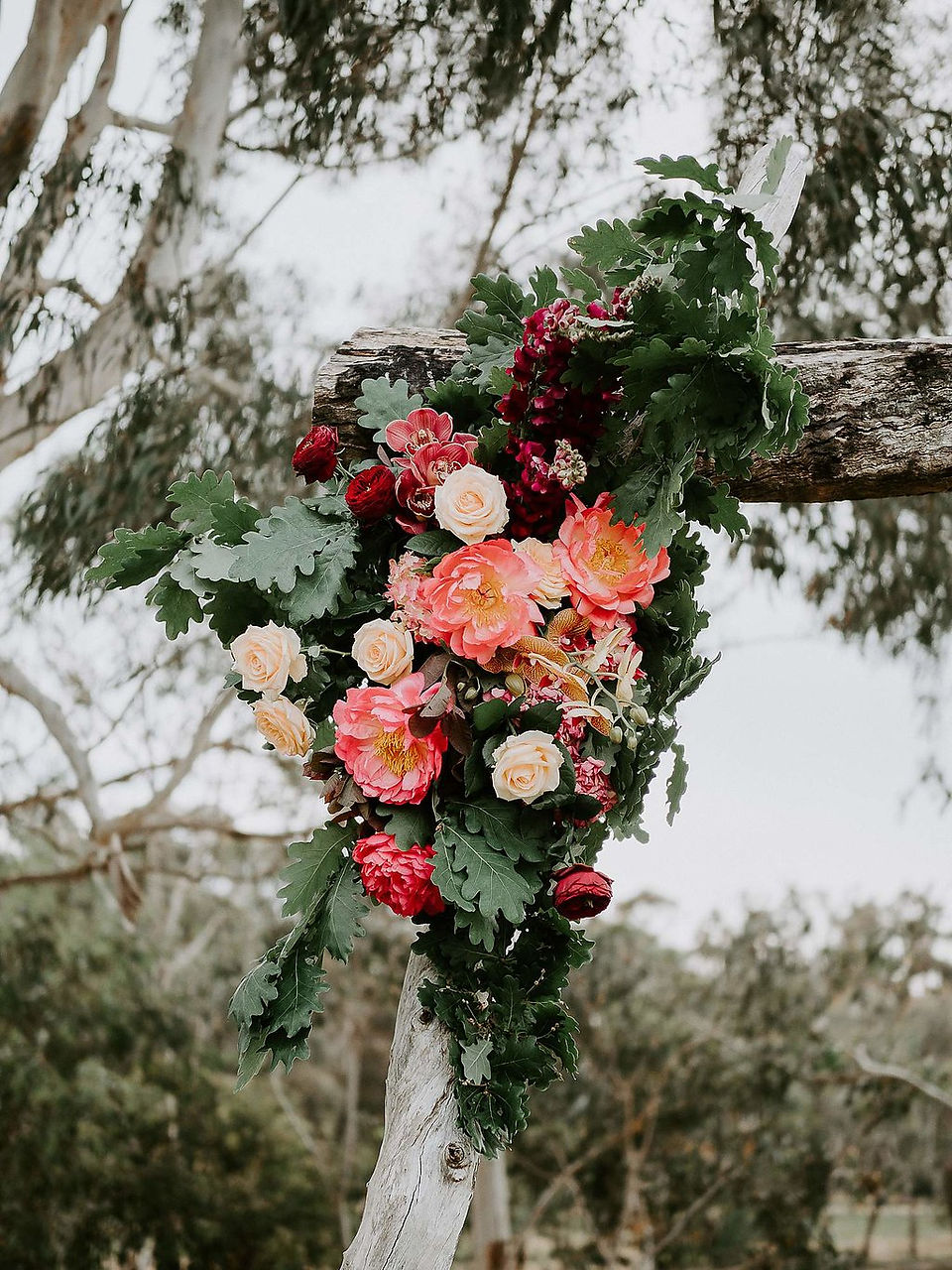close up of wedding flower archway installation