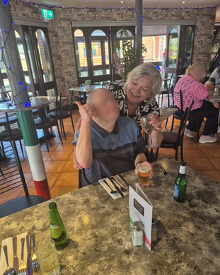 Supporting a gentleman at a restaurant to celebrate his birthday