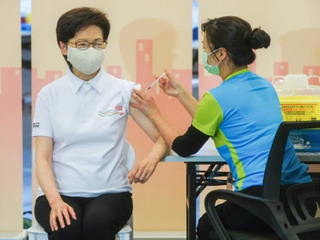 Hong Kong leader Carrie Lam gets city’s first Covid-19 jab