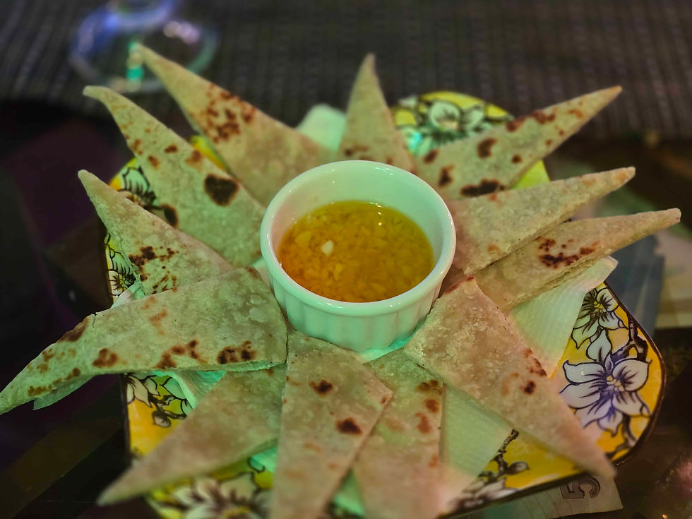 Roti pieces with Gralic sauce