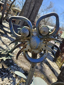 A fun cat sculpture made from scrap metal at Dr Evermores Sculpture park