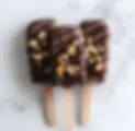 stephanekoschall_A_delicious_chocolate_ice_cream_pop_with_cas_79332604-33e7-45d2-9d76-ce30