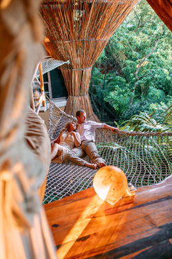 Ace and Brian Woods in hammock at Azulik Tulum
