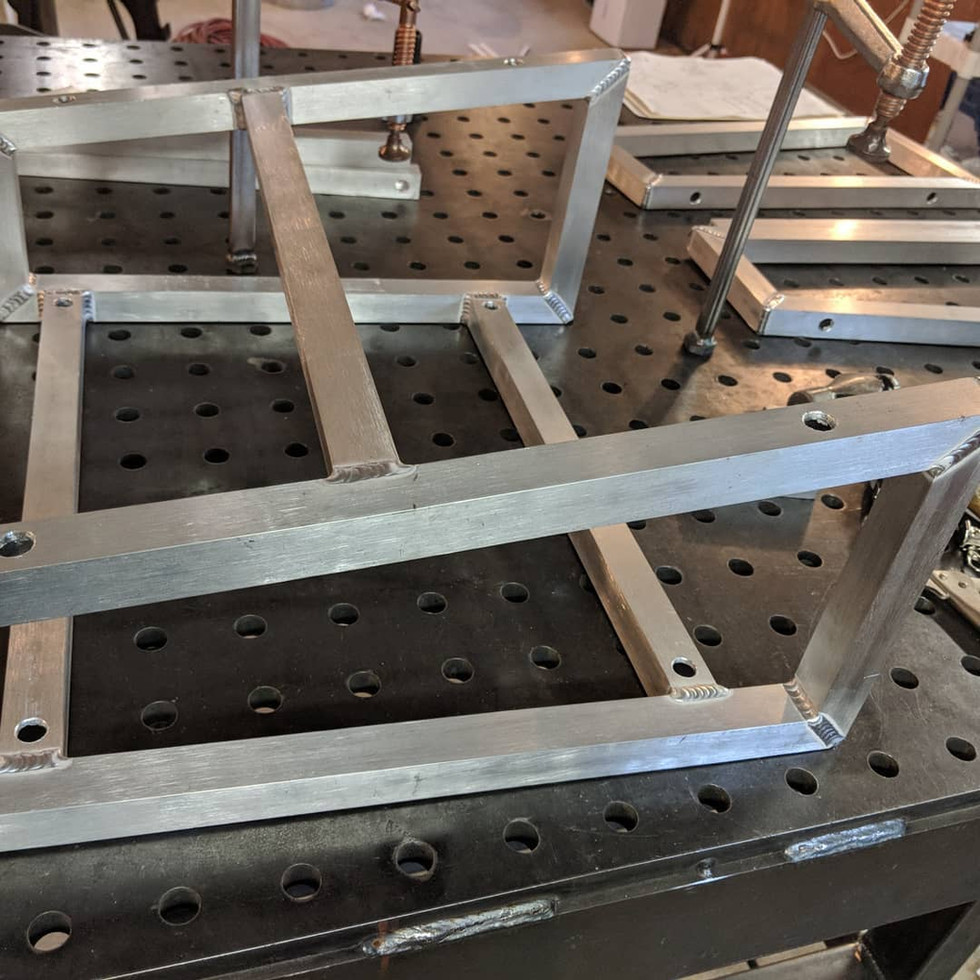 A custom seat mount for a hot rodded 1957 GM pickup. Customer provided a seat mount that almost worked for reference. This seat mount weighs only 5.93 pounds vs. the factory at 10.9 pounds. Direct fitup.