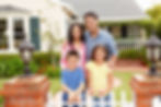 Family in front of house.jpeg