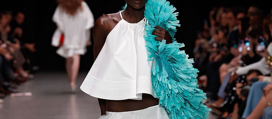 Stella McCartney’s Fevvers at Paris Fashion Week highlighting plant-based innovation in sustainable fashion.