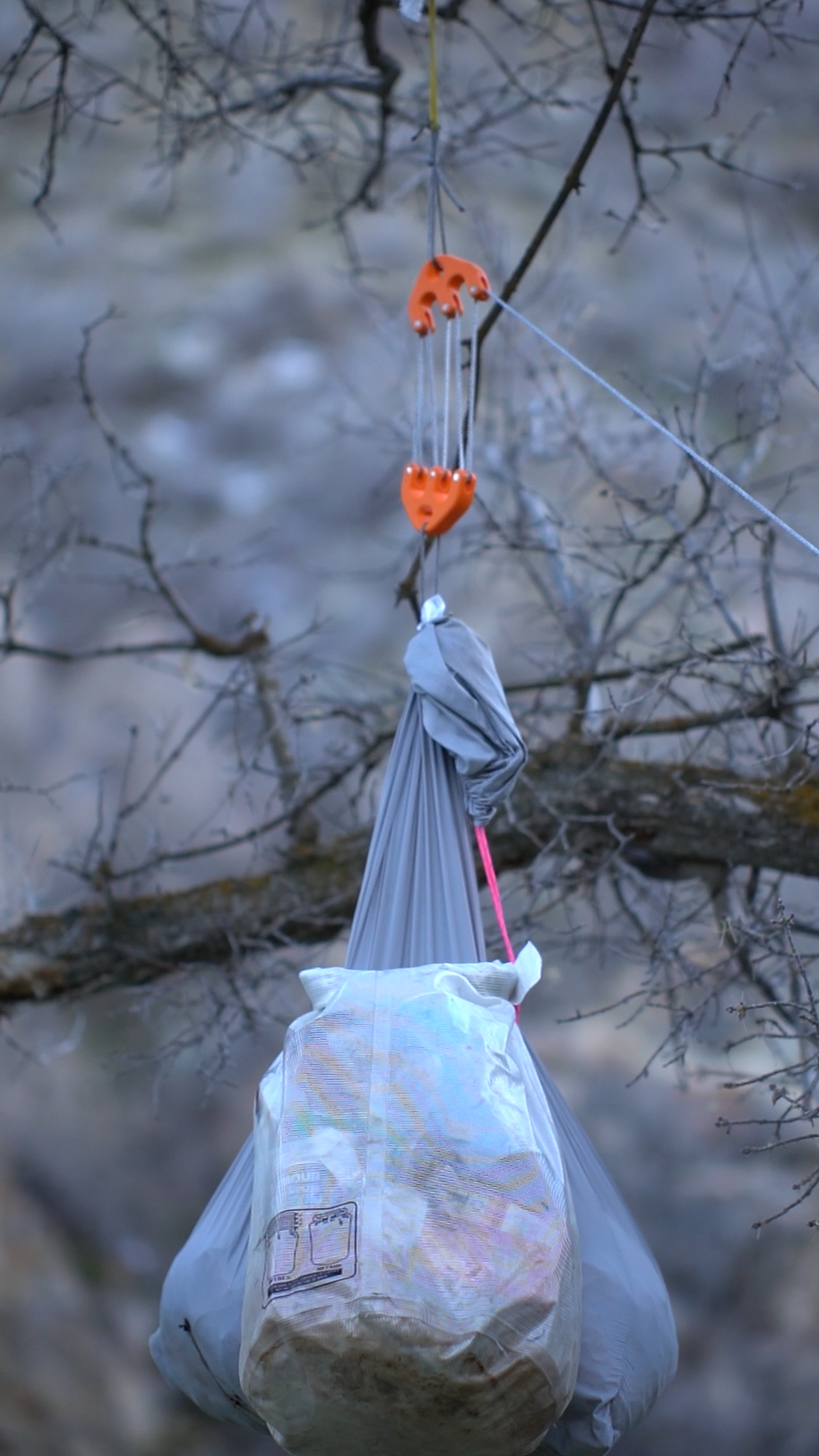 Game & Gear Hoist Lifting a Heavy Game Bag and The Camp Dry Bag Full of Food and Gear