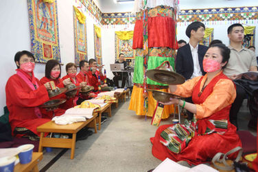 Cymbals and conches are played as part of the invocation during the 2025 100,000 Ganachakra Offerings Ceremony.