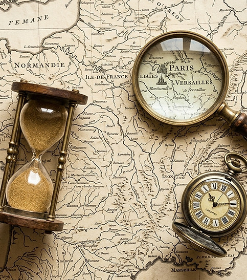 Old_map_with_magnifying_glass_202605281520.jpeg
