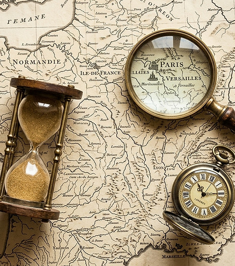 Old_map_with_magnifying_glass_202605281520.jpeg