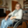 Smiling senior woman in wheelchair at home
