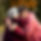 Man and woman embracing outdoors
