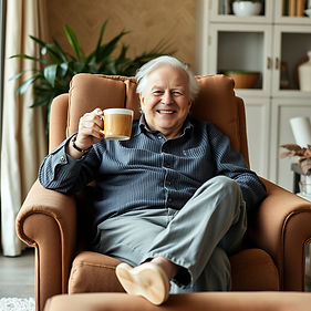 Happy senior enjoying coffee at home