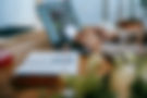 person-working-on-laptop-with-notebook-and-coffee-at-desk-stock-photo.jpg