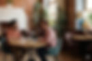 two-men-business-meeting-laptop-cafe.jpg
