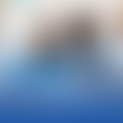 a woman explaining financial paperwork to another woman